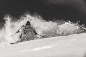 Piers Solomon skiing powder on DPS Lotus 138.